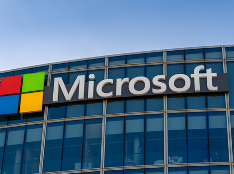 Microsoft logo on a modern office building