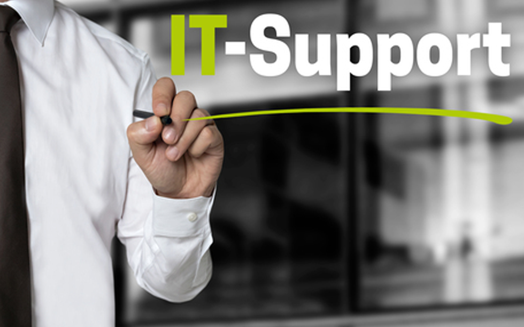 IT Support text with a person writing on a screen