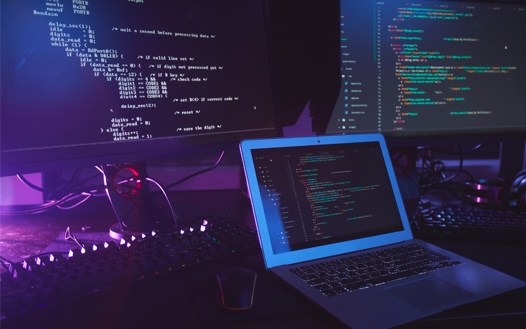 Computers displaying code, suggesting penetration testing and cybersecurity.