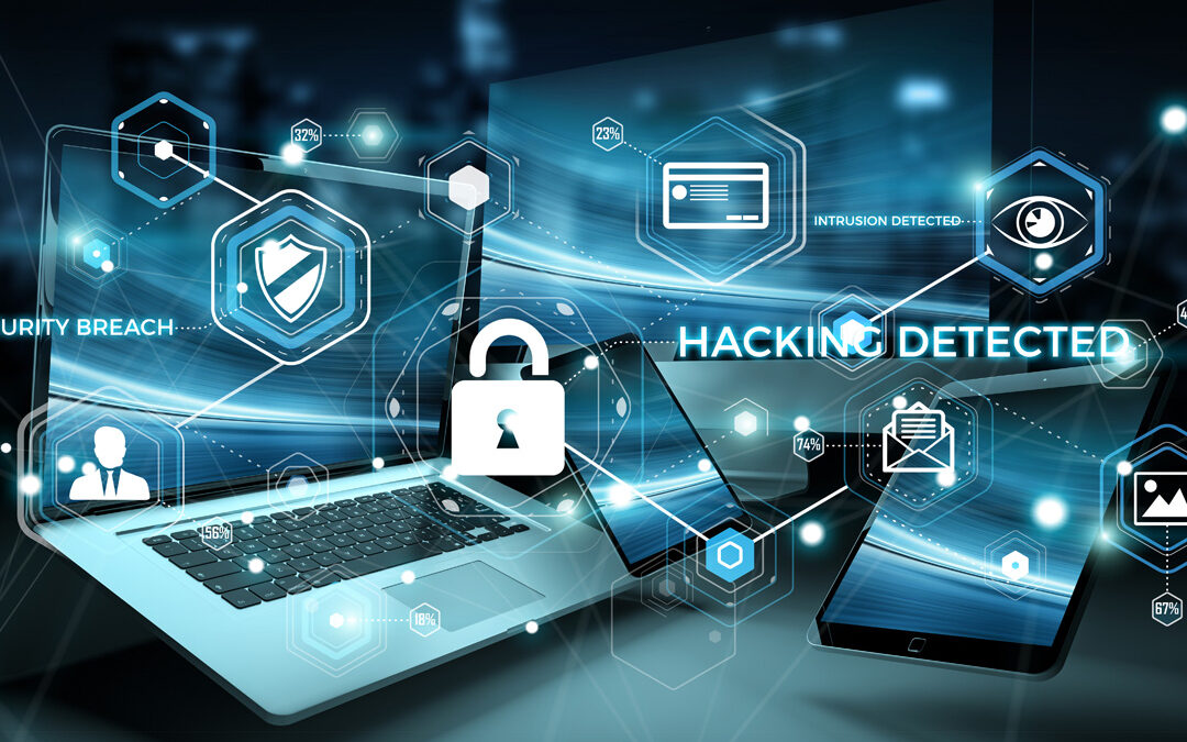 Cybersecurity concept: Hacking detected on laptop & phone with lock icon.